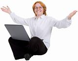 Woman sitting with the laptop on white