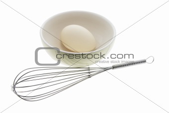White Egg on Bowl with Egg Whisk