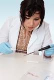 Forensic scientist obtaining sample 