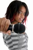 young girl showing microphone