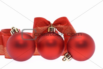 Red christmas balls and ribbon