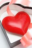 Red Heart Symbol in Heart-shaped Gift Box