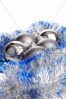 Christmas balls with silver and blue tinsel