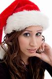close up of woman wearing christmas hat
