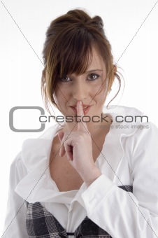 smiling woman instructing you to keep silent