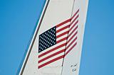 american flag on tail of airplane