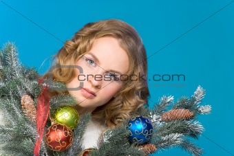 Decorated Christmas portrait of blond woman