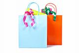 Two shopping bags with gifts inside