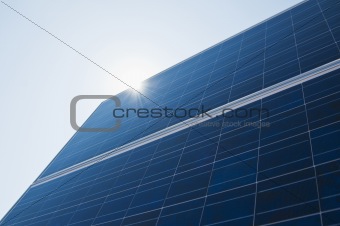 solar panel with sun hitting it
