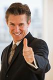businessman with thumbs up