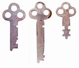 Three rusty weathered skeleton keys
