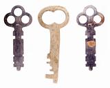 Three odd old keys isolated on a white background