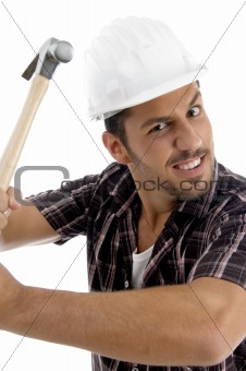 architect showing his hammer with facial expressions