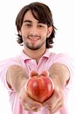 smiling man showing apple