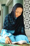 Muslim Girl Reading Qur'an