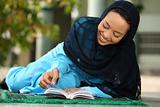Muslim Girl Reading Qur'an