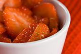 Fresh strawberries in a white pot