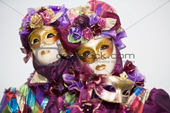 Purple Venetian costume with roses