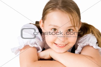 A smiling blond girl with brown eyes
