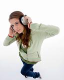woman listening to headset enjoying