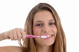 charming woman brushing her teeth