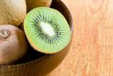 Kiwi in a wooden bowl