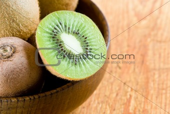 Kiwi in a wooden bowl