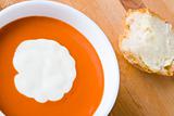 Tomato soup with cream and bread