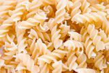A pile of un-cooked pasta twirls