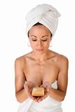 Ethnic Woman preparing for sauna hold bar of soap