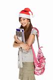 Asian student girl in Christmas Santa hat with composition book 