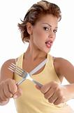 young woman posing with fork and knife