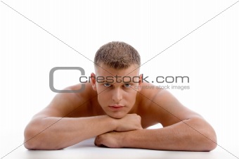 laying muscular male looking at you