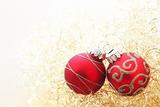 Red christmas balls in golden wool