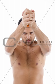 muscular man posing with knife 