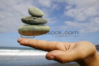 Hand and Floating Pebbles