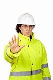 Female construction worker saying stop
