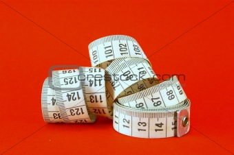 Measuring Tape on Red