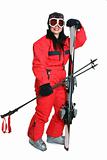 Female skier in red ski suit
