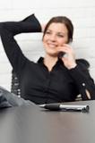 Attractive businesswoman on cell phone