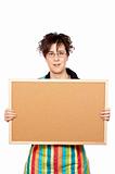 Housewife holding the empty corkboard