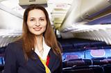 air hostess (stewardess) in the empty airliner cabin
