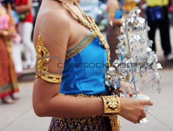 Thai female in bright traditional dress 