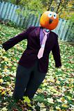 Pumpkin person in a suit