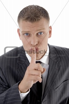 businessman asking to keep silent