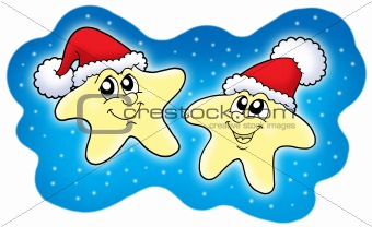 Stars in Christmas caps on blue sky