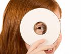 Blank sign - red head girl with CD or DVD disk (copy space)