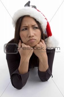 christmas hat wearing female in sad mood