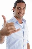 smiling man with hand gesture