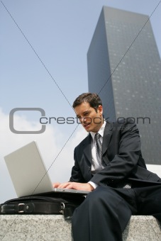young businessman with laptop computer